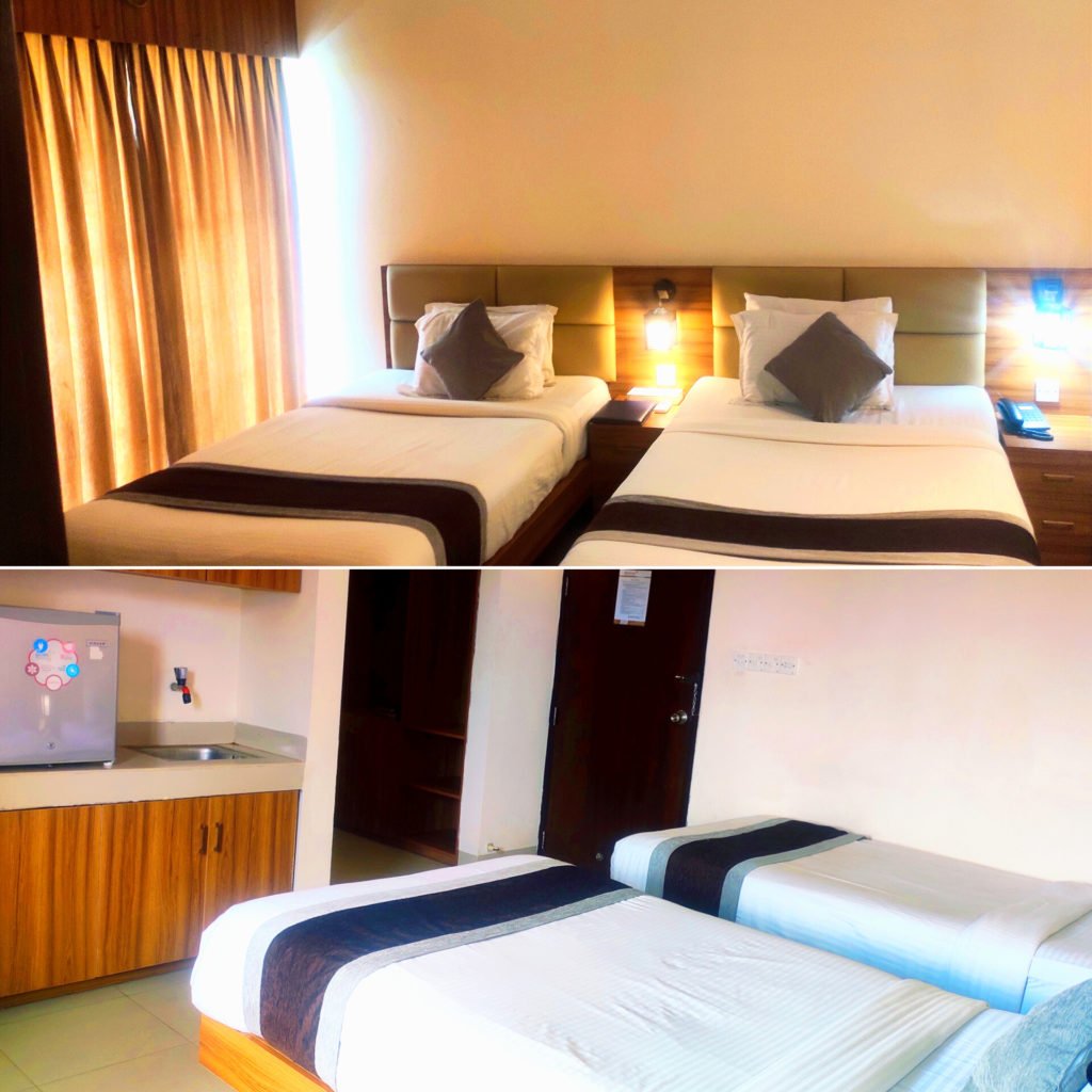 Twin bed room and compact kitchenette at Neeshorgo Hotel and Resort, Cox's Bazar