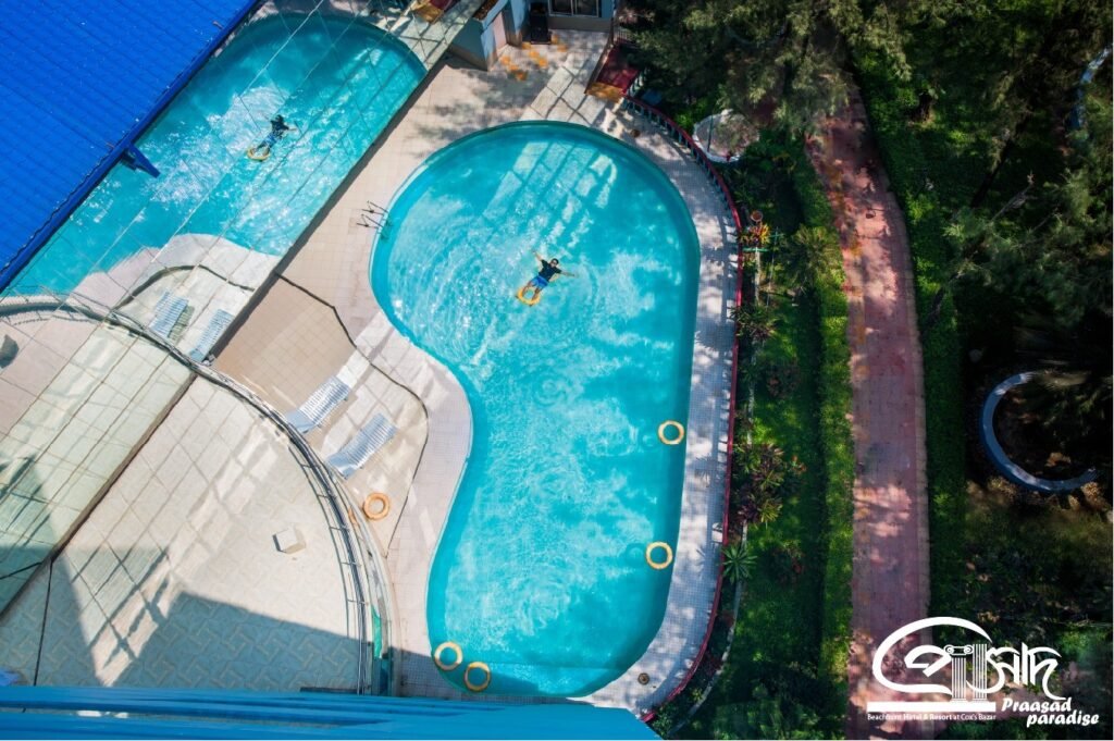 Aerial view of the outdoor swimming pool at Praasad Paradise Hotel and Resort, Cox's Bazar