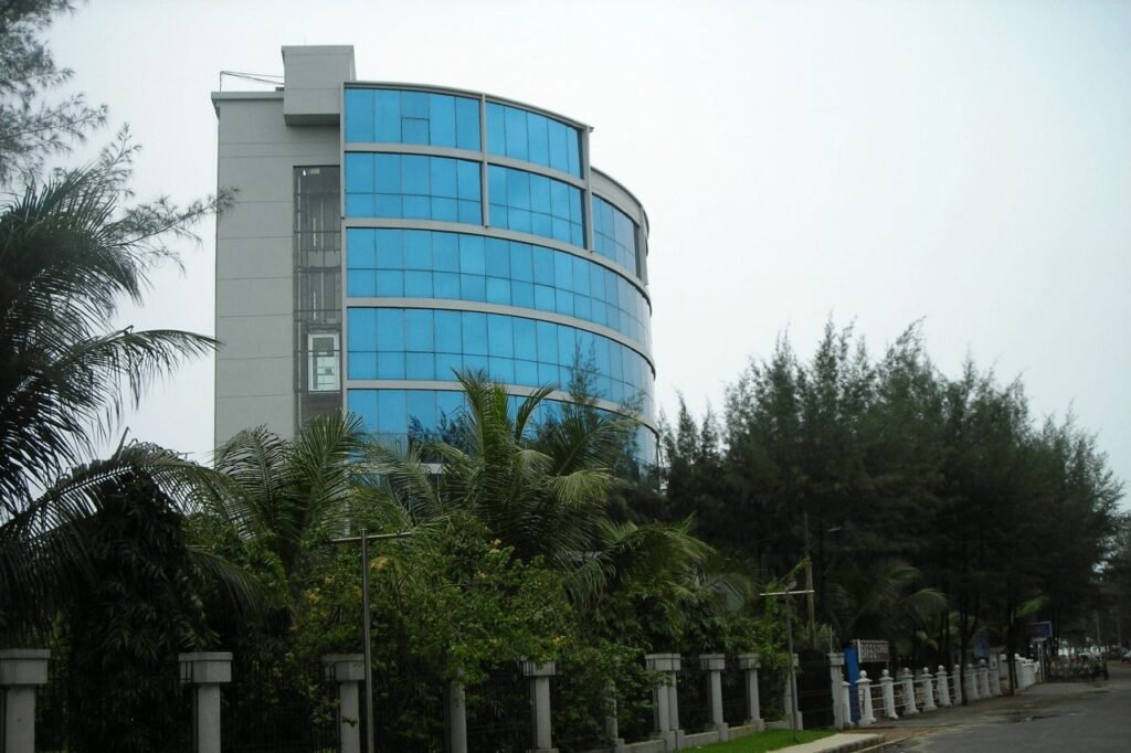 Praasad Paradise Hotel and Resort curved-glass tower on New Beach Road, Cox's Bazar