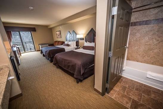 Deluxe Guest Room with two queen beds at Camelback Resort, Tannersville PA