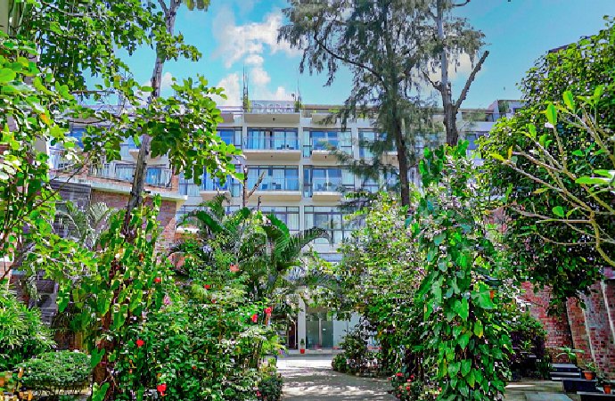 Sea View Tower guest room with balcony at DERA Resort & Spa, Cox's Bazar