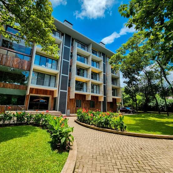 Main building exterior with garden entrance at Seagull Resort and Spa Village, Tangail