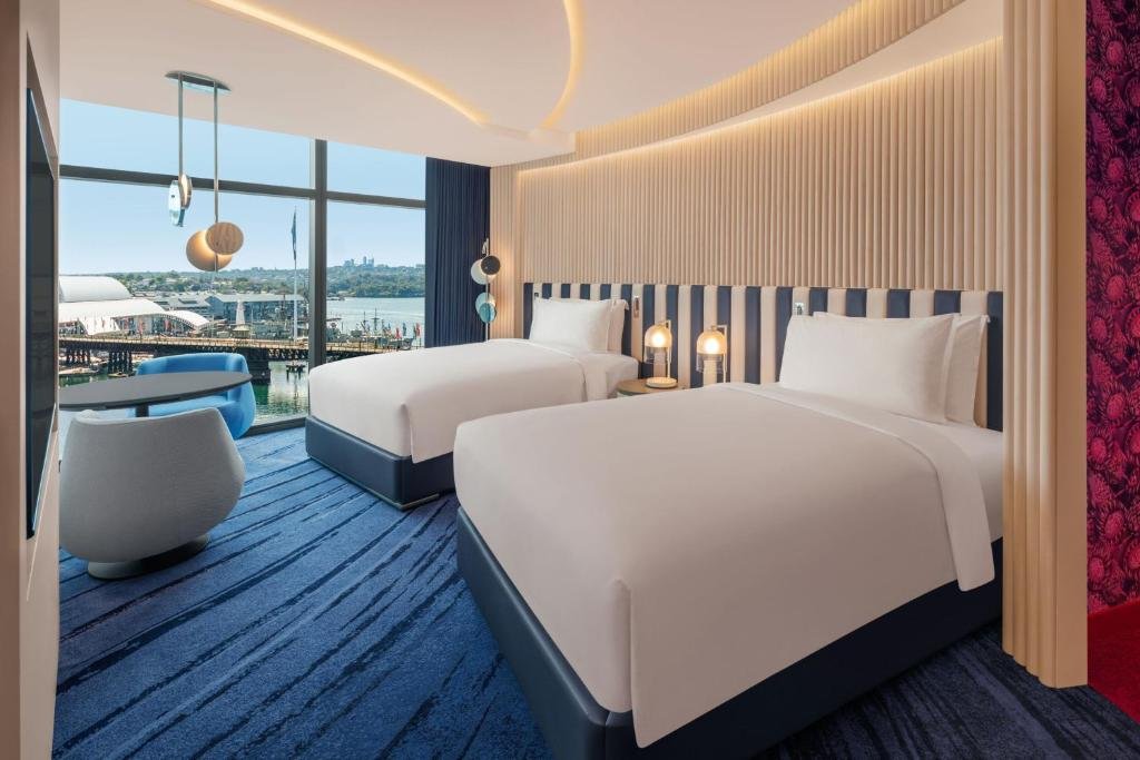 W Sydney guest room with twin beds and harbour view